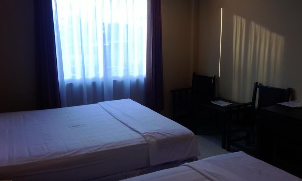 Hotel Sing A Song Pematangsiantar Habitación foto